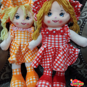Cute looking smiling doll